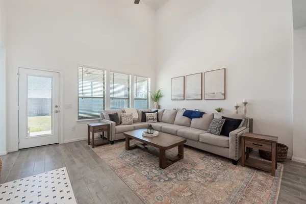 a living room with furniture and a window