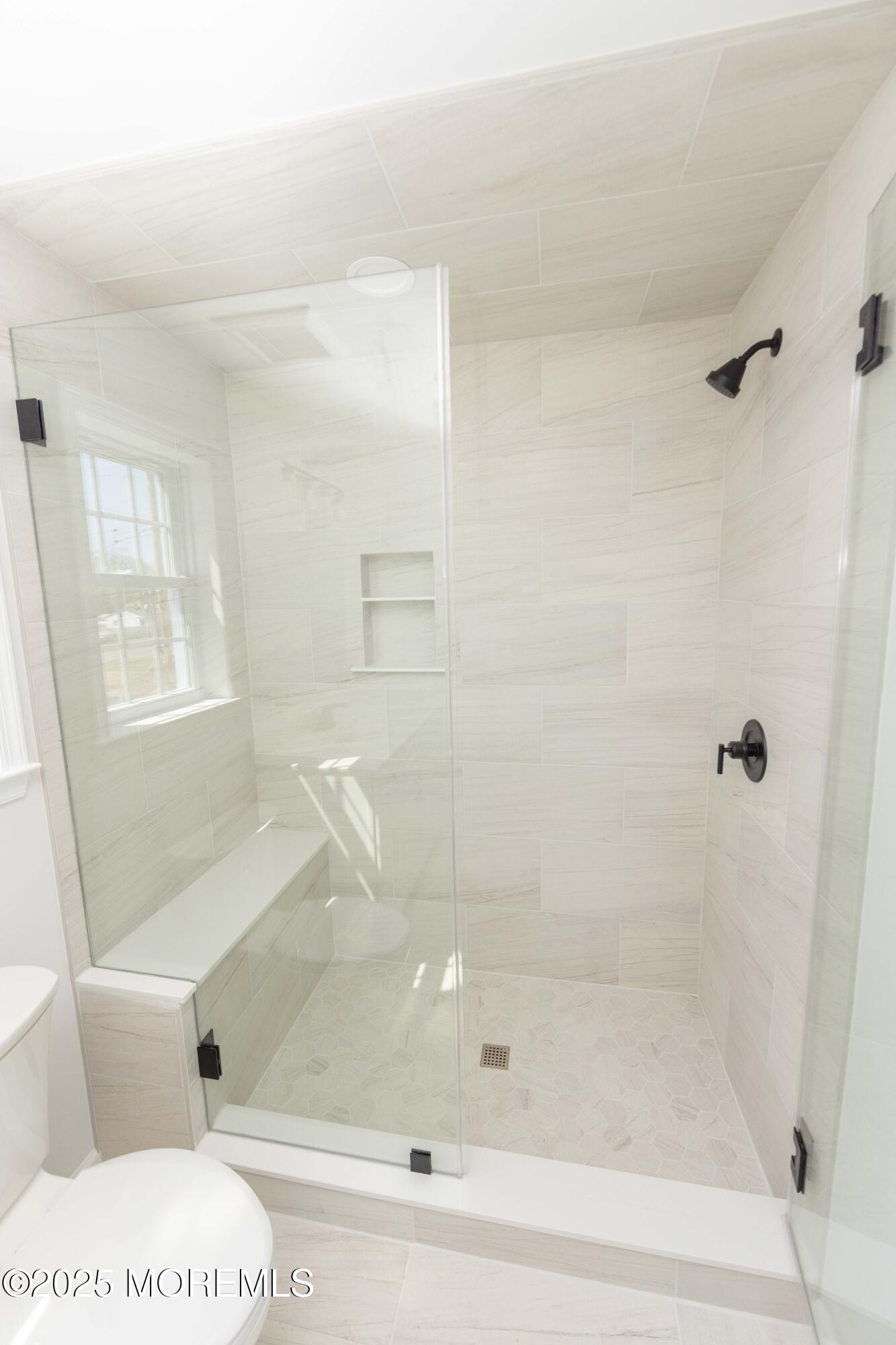 1517 Whitcomb Road Forked River, NJ 08731 - Photo 11 of 18 a bathroom with a bathtub and a shower