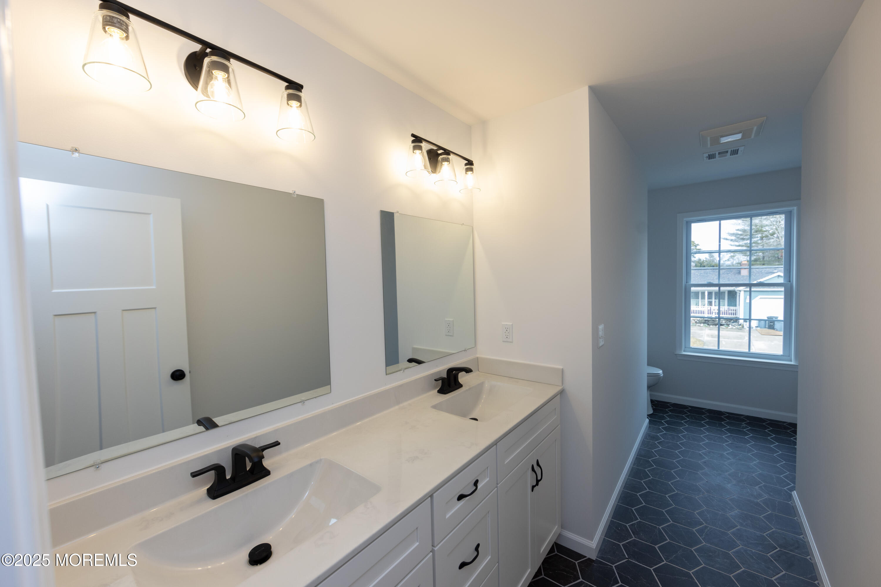 1517 Whitcomb Road Forked River, NJ 08731 - Photo 13 of 18 a bathroom with a tub sink and mirror