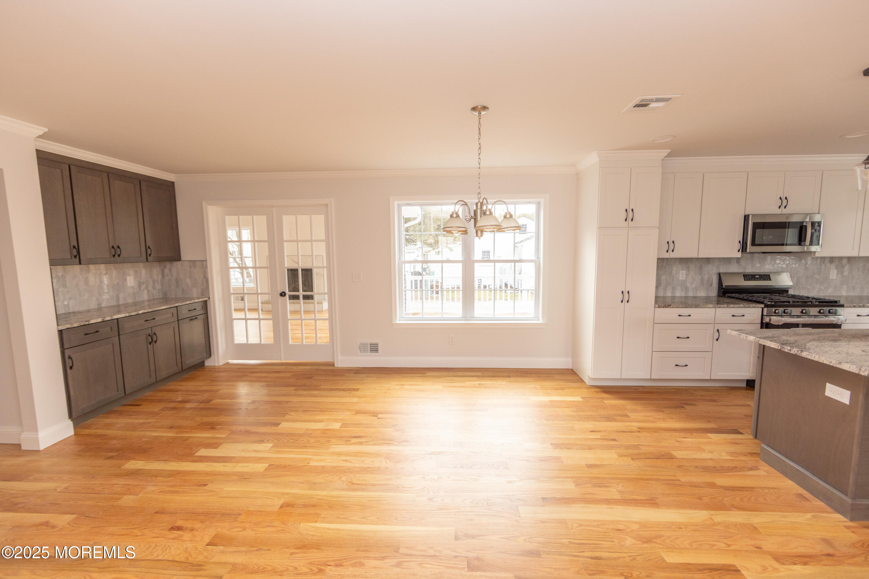 1517 Whitcomb Road Forked River, NJ 08731 - Photo 5 of 18 a view of kitchen with granite countertop cabinets and refrigerator