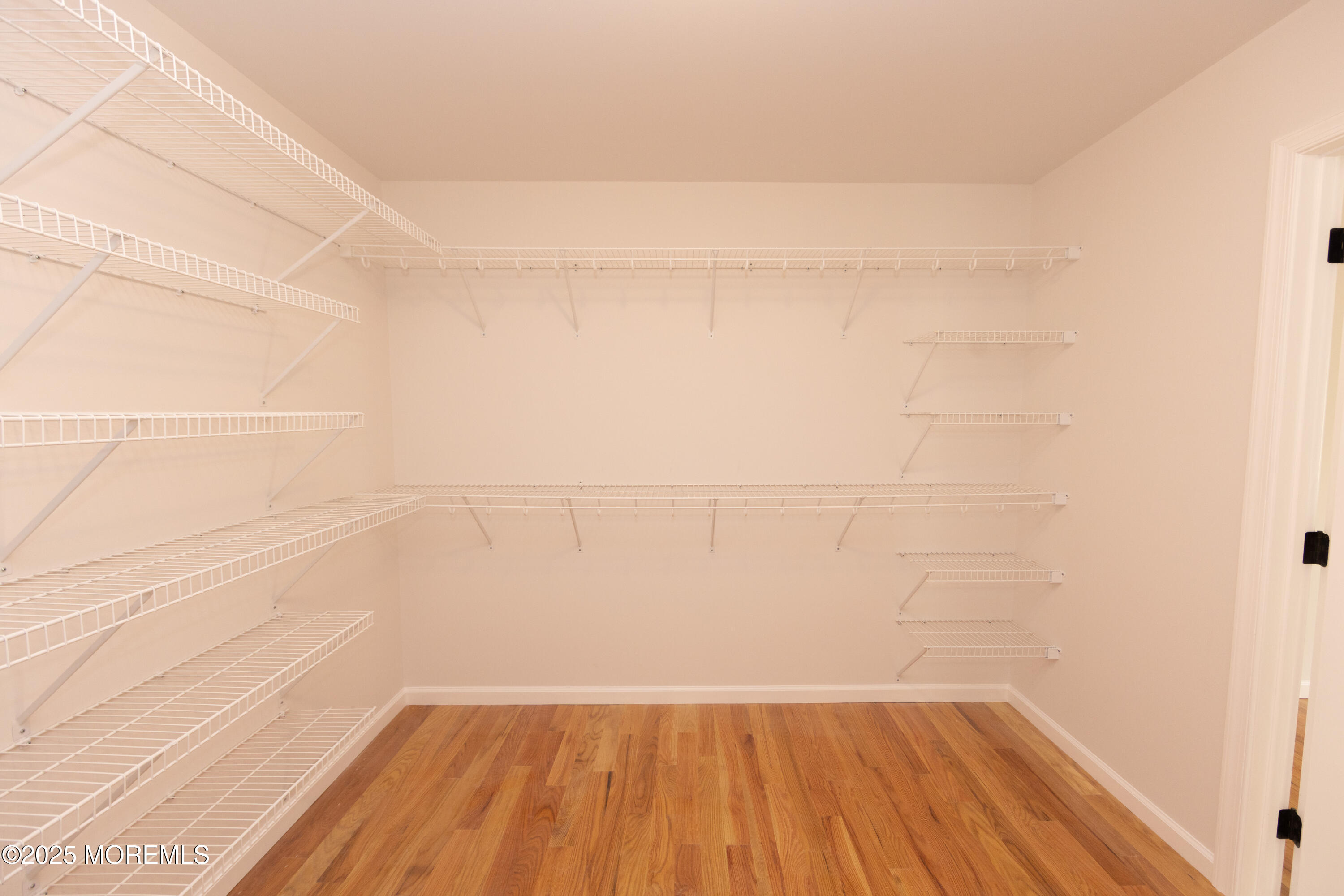 1517 Whitcomb Road Forked River, NJ 08731 - Photo 8 of 18 a view of a small space with wooden floor