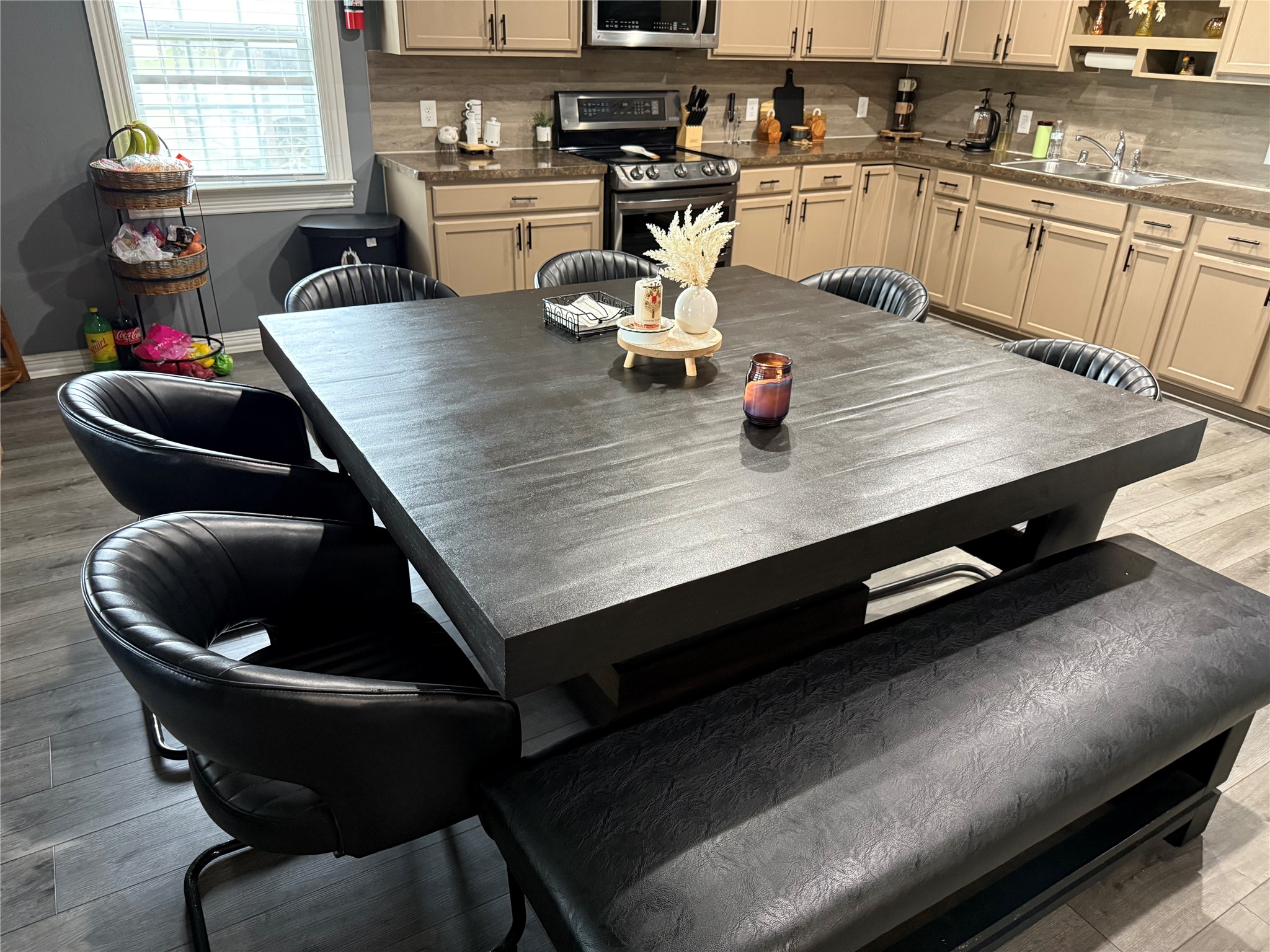 13125 1st Street Kendleton, TX 77417 - Photo 7 of 23 a kitchen with a table chairs and appliances
