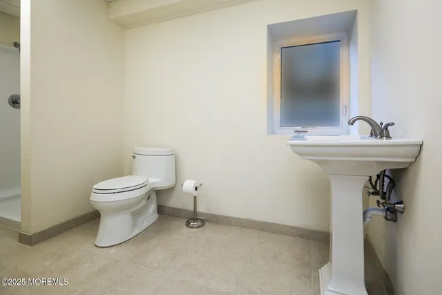 a view of a chairs on the roof deck