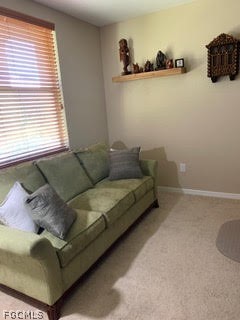 3740 Pebblebrook Ridge Court, Unit 102 Fort Myers, FL 33905 - Photo 11 of 46 a living room with furniture and a window