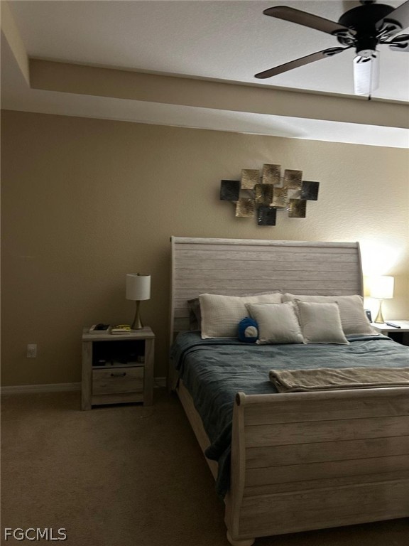 3740 Pebblebrook Ridge Court, Unit 102 Fort Myers, FL 33905 - Photo 16 of 46 a bed sitting in a bedroom next to a lamp