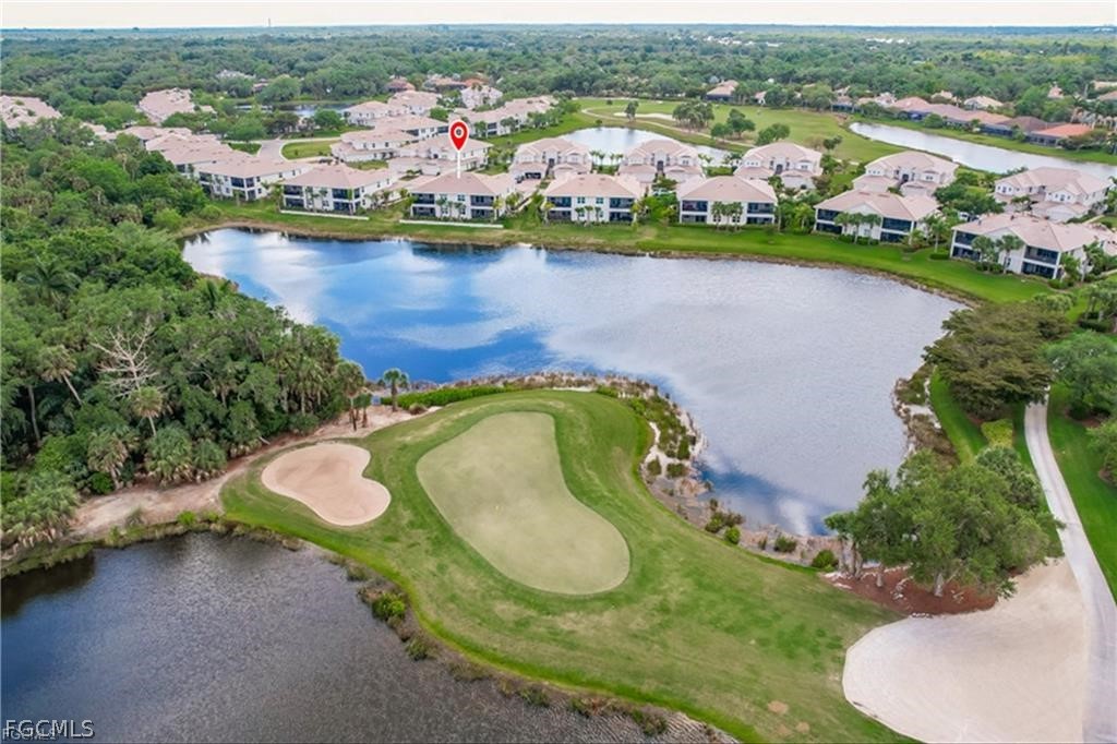 3740 Pebblebrook Ridge Court, Unit 102 Fort Myers, FL 33905 - Photo 2 of 46 an aerial view of a house with a swimming pool yard and outdoor seating