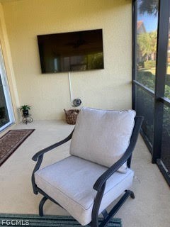 3740 Pebblebrook Ridge Court, Unit 102 Fort Myers, FL 33905 - Photo 26 of 46 a room with furniture and flat screen tv