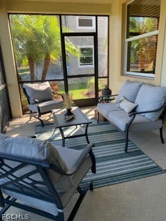 3740 Pebblebrook Ridge Court, Unit 102 Fort Myers, FL 33905 - Photo 27 of 46 a living room with furniture and a large window