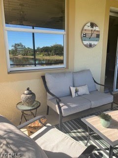 3740 Pebblebrook Ridge Court, Unit 102 Fort Myers, FL 33905 - Photo 28 of 46 a living room with a couch and a table