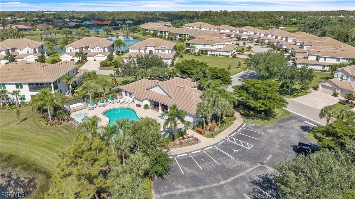 3740 Pebblebrook Ridge Court, Unit 102 Fort Myers, FL 33905 - Photo 33 of 46 an aerial view of residential houses with outdoor space