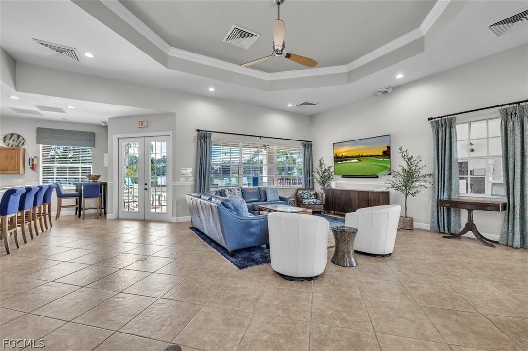 3740 Pebblebrook Ridge Court, Unit 102 Fort Myers, FL 33905 - Photo 36 of 46 a living room with fireplace furniture and a large window