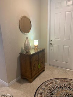 3740 Pebblebrook Ridge Court, Unit 102 Fort Myers, FL 33905 - Photo 4 of 46 a bathroom with a sink and a mirror