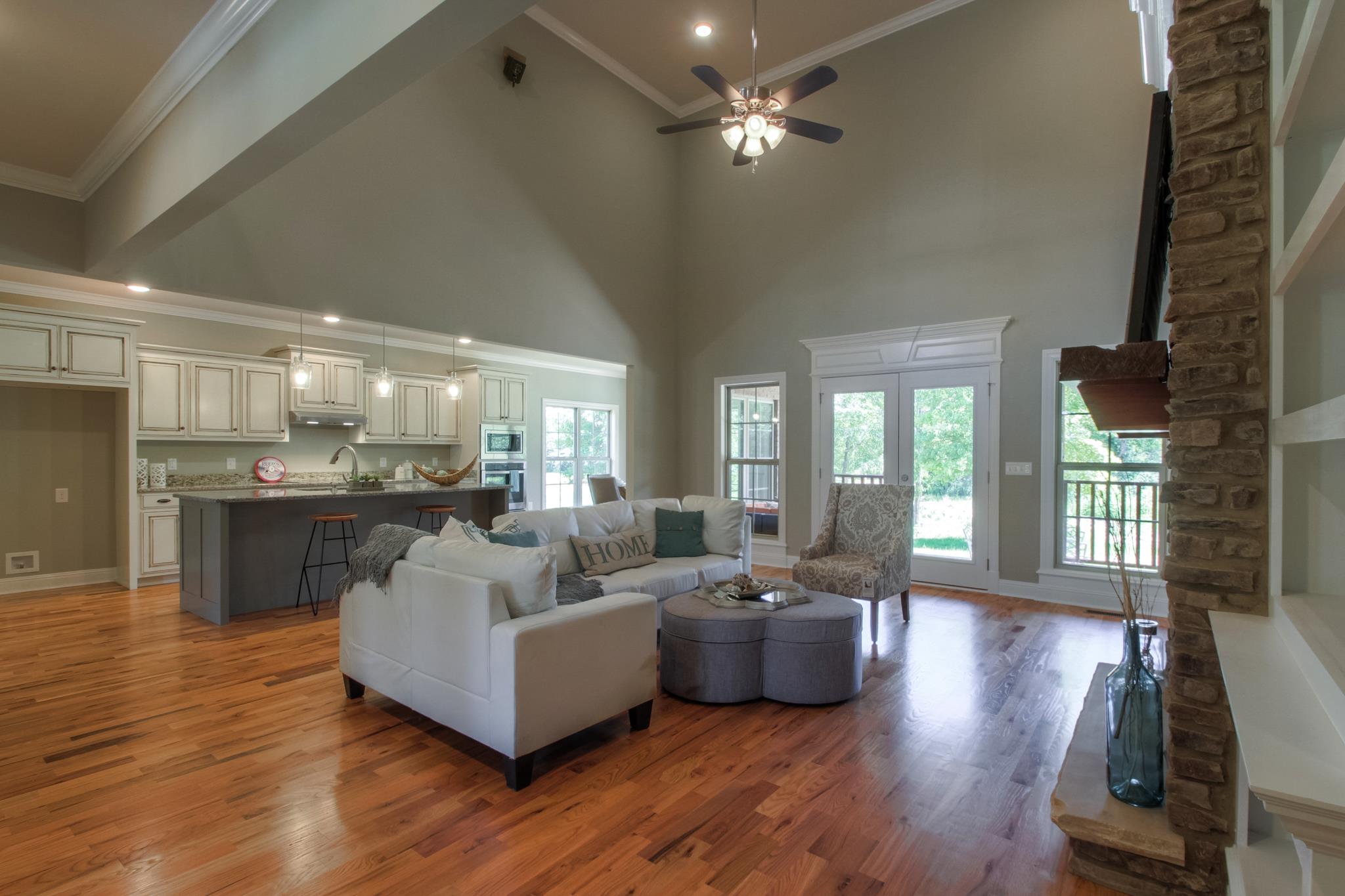 3393 East Compton Road Murfreesboro, TN 37130 - Photo 8 of 30 Another view of living room those double doors to the outside open.