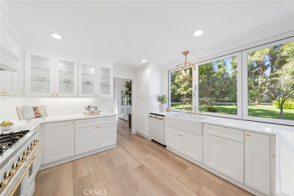 30050 Cielo Mesa Temecula, CA 92592 - Photo 12 of 43 a large white kitchen with a large window