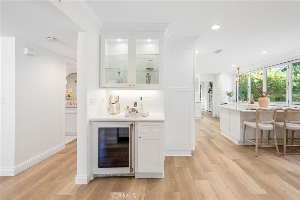 30050 Cielo Mesa Temecula, CA 92592 - Photo 15 of 43 a living room with stainless steel appliances granite countertop furniture wooden floor and a kitchen view