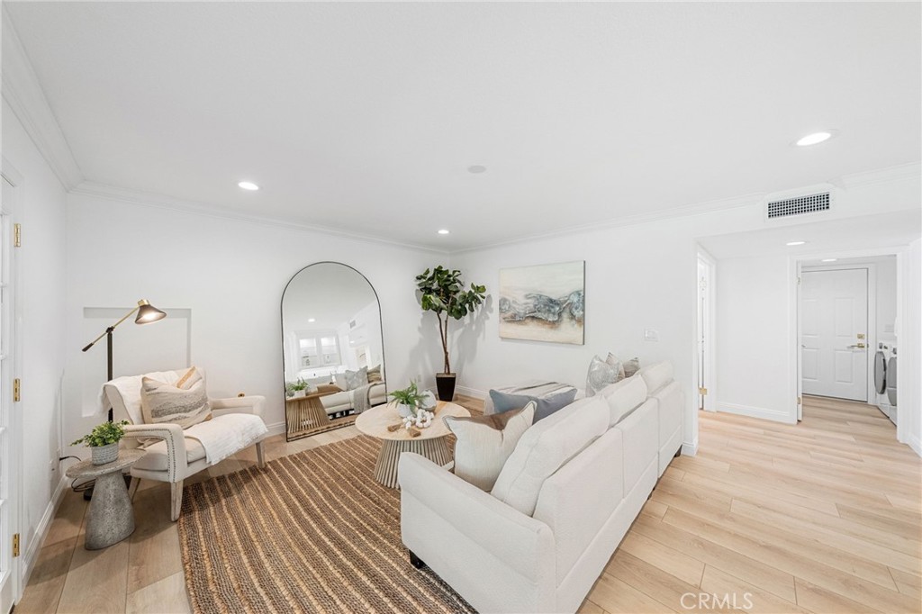30050 Cielo Mesa Temecula, CA 92592 - Photo 16 of 43 a living room with furniture and a wooden floor