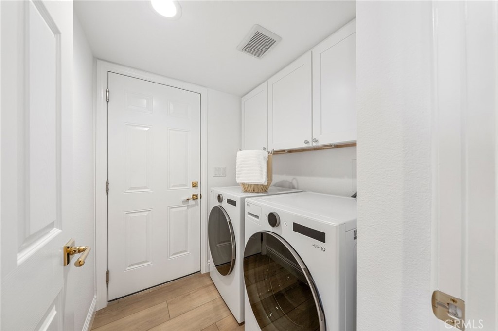 30050 Cielo Mesa Temecula, CA 92592 - Photo 20 of 43 a utility room with dryer and washer