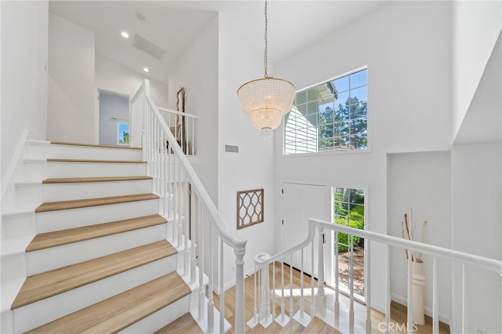 30050 Cielo Mesa Temecula, CA 92592 - Photo 23 of 43 a view of entryway and hall with wooden floor