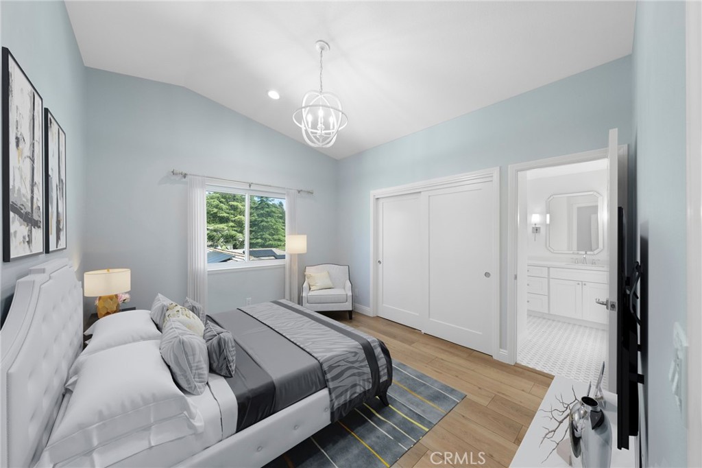 30050 Cielo Mesa Temecula, CA 92592 - Photo 32 of 43 a bedroom with a large bed and a window