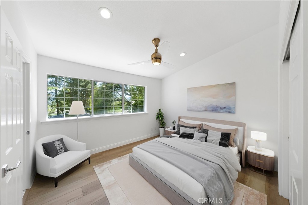 30050 Cielo Mesa Temecula, CA 92592 - Photo 34 of 43 a bedroom with a bed and a couch