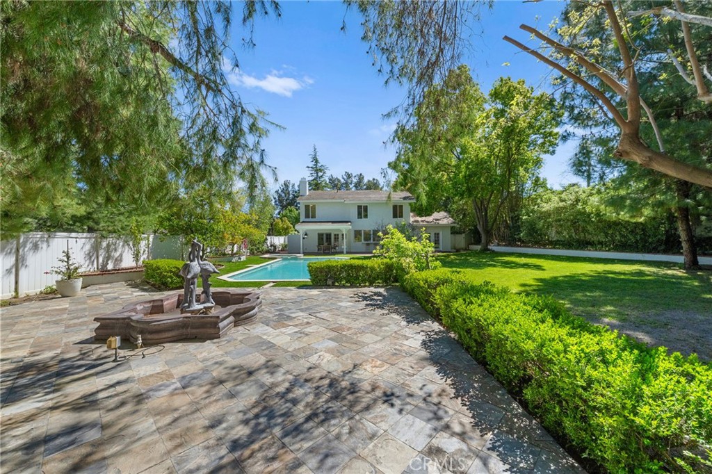 30050 Cielo Mesa Temecula, CA 92592 - Photo 39 of 43 a view of a backyard with plants and trees