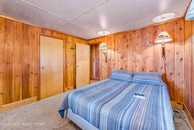 a view of living room with furniture and window