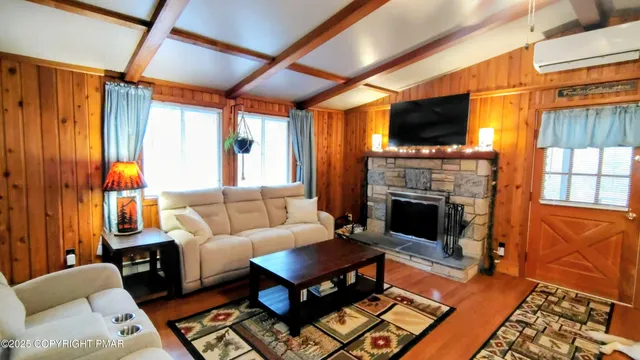 a view of room with wooden walls