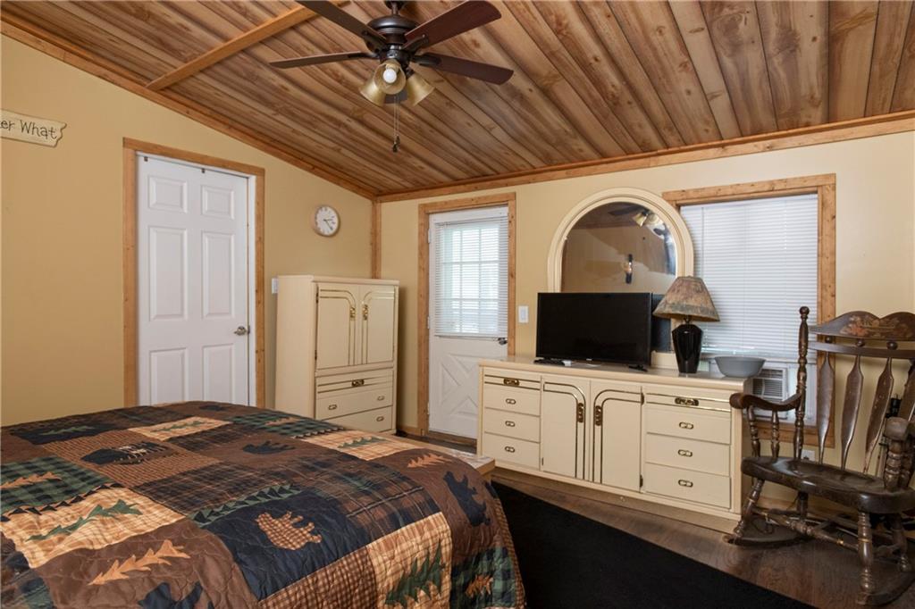 9133 South Watson Run Road Meadville, PA 16335 - Photo 18 of 45 a bedroom with a bed and a flat screen tv