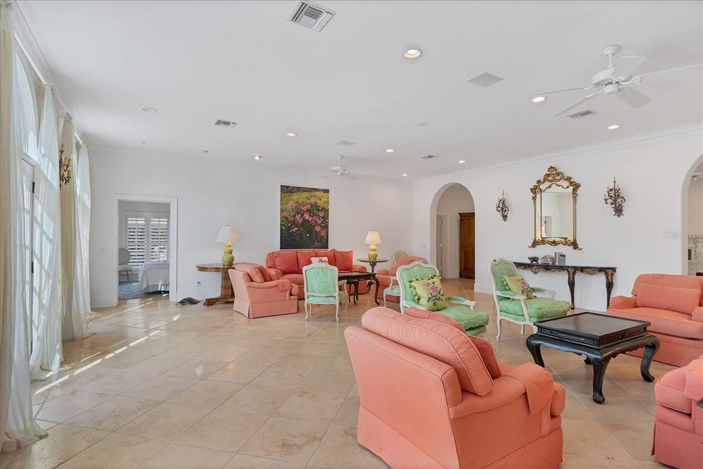 1031 10th Street West Boca Grande, FL 33921 - Photo 13 of 45 a living room with furniture and a table