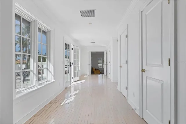 a bedroom with a bed a couch and dresser