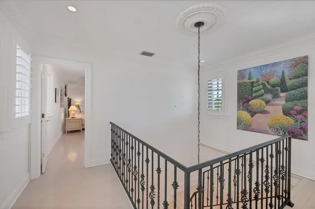 a bathroom with a granite countertop shower sink and mirror