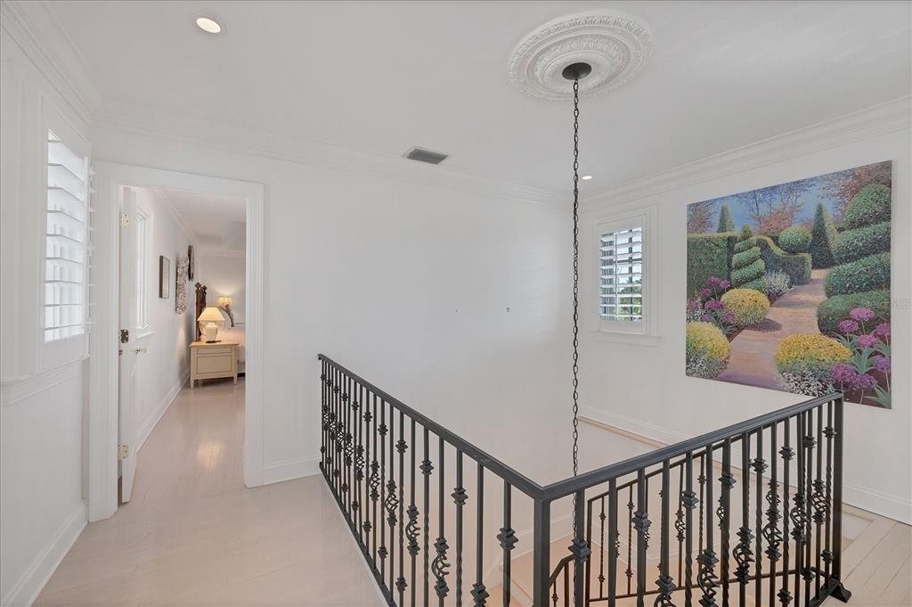 1031 10th Street West Boca Grande, FL 33921 - Photo 23 of 45 a view of a hallway to a livingroom and a furniture