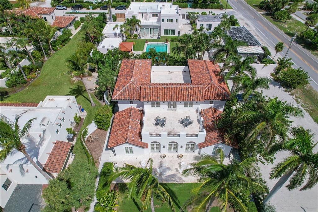 1031 10th Street West Boca Grande, FL 33921 - Photo 8 of 45 an aerial view of a house with a garden