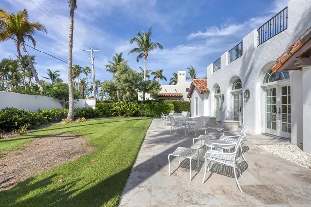a living room with fireplace furniture and a fireplace