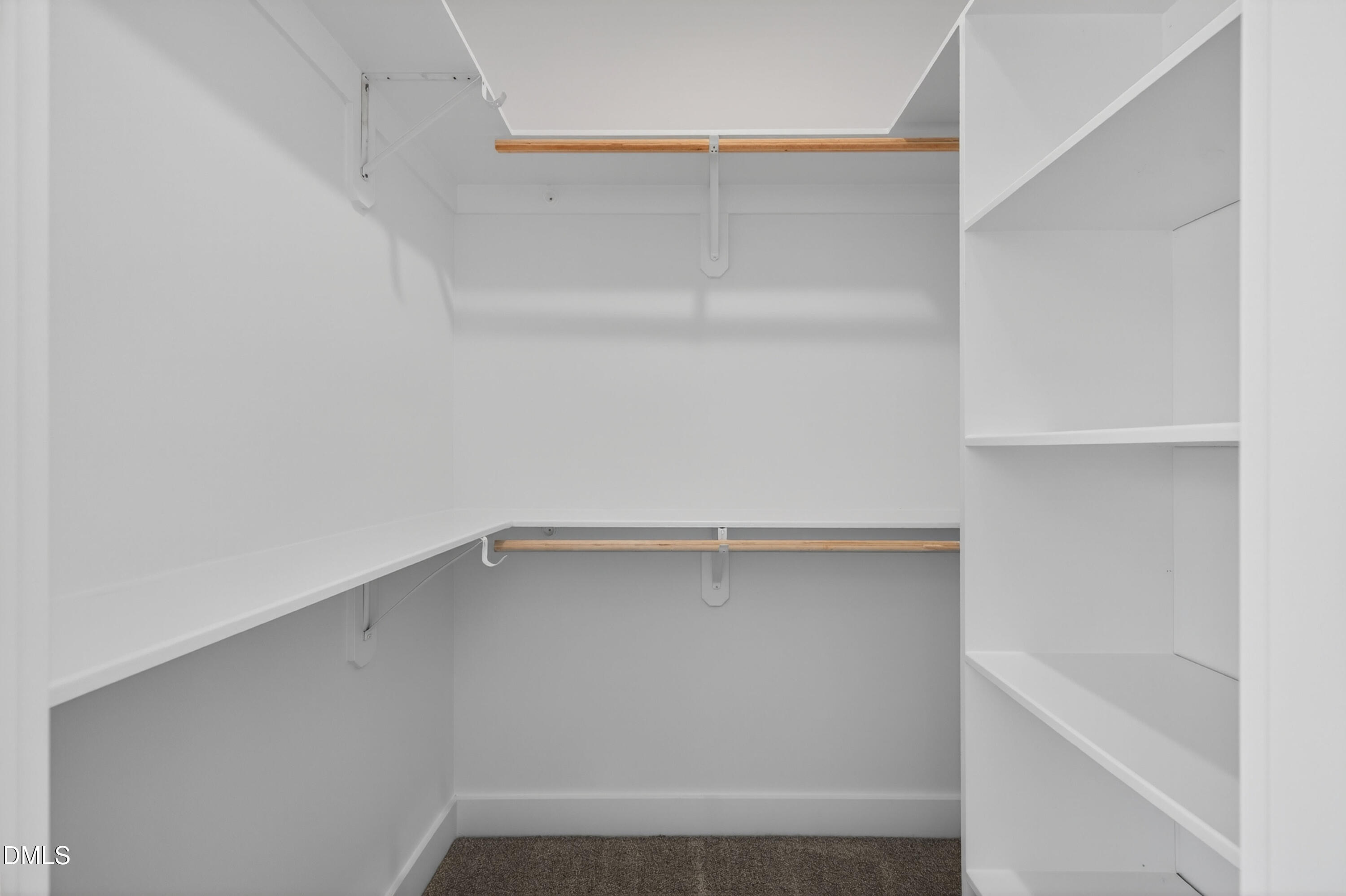 1196 Hurdle Mills Road Roxboro, NC 27573 - Photo 37 of 50 a view of an empty walk in closet