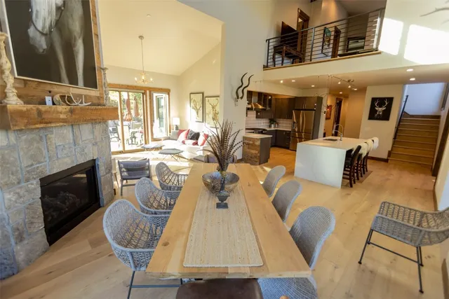 a view of living room with furniture and fireplace