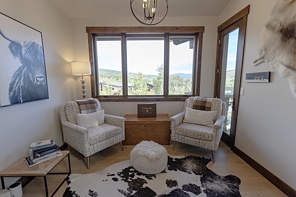230 Game Trail Road Silverthorne, CO 80498 - Photo 17 of 46 a living room with furniture and a large window