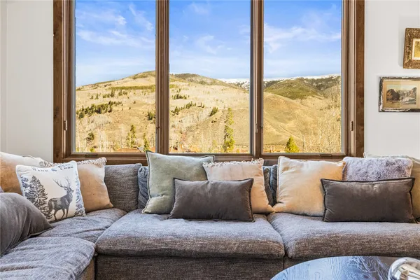 a bed room with a bed and a chandelier