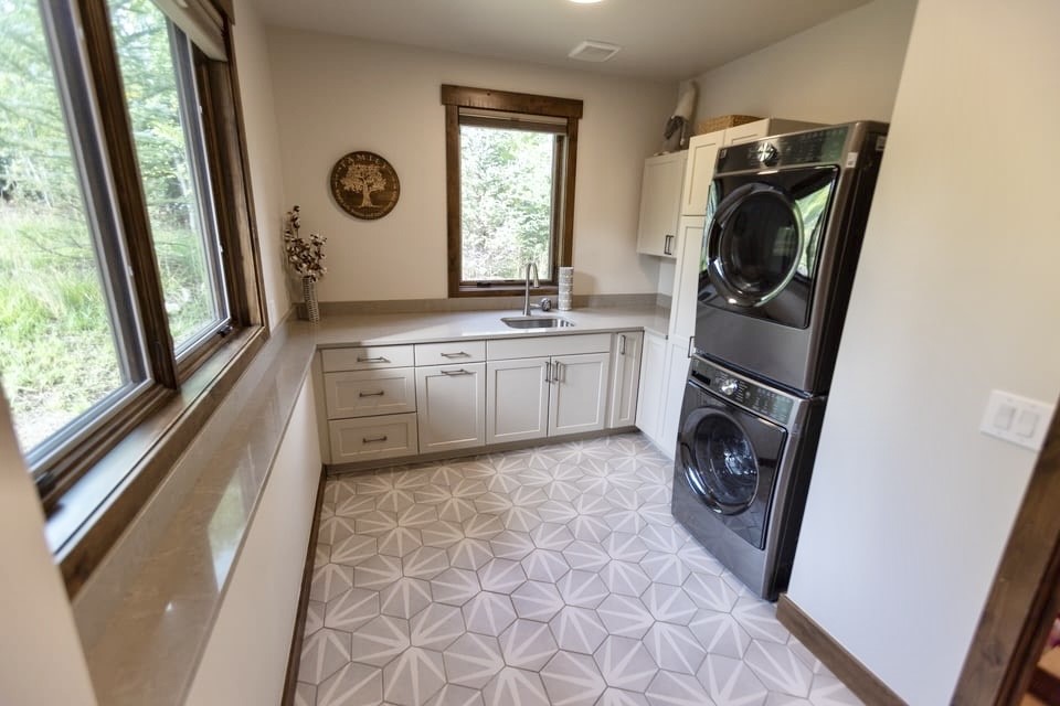 230 Game Trail Road Silverthorne, CO 80498 - Photo 22 of 46 a view of a hallway with washer and dryer