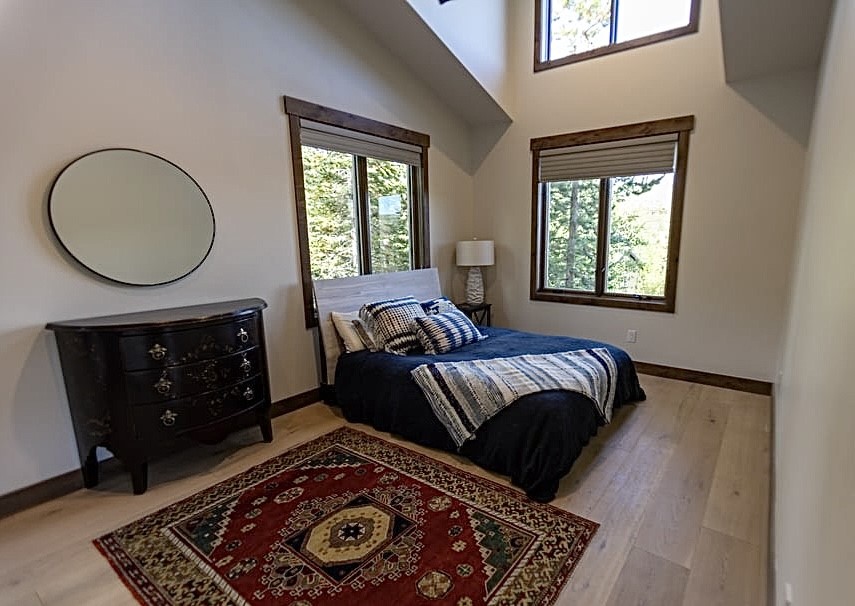 230 Game Trail Road Silverthorne, CO 80498 - Photo 26 of 46 a living room with a couch and a fireplace