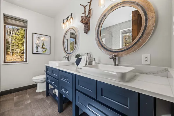 a bedroom with a bed and a walk in closet