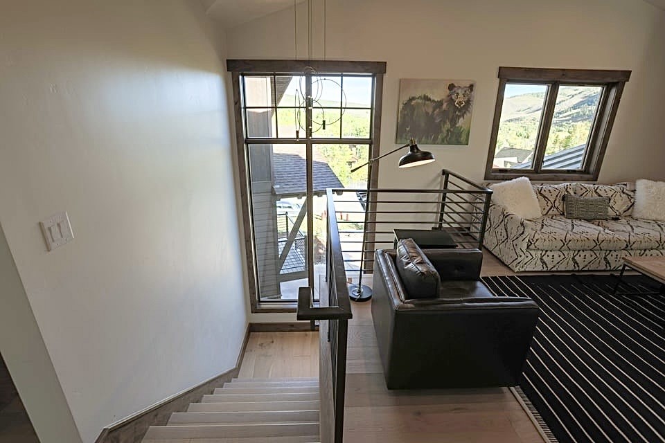 230 Game Trail Road Silverthorne, CO 80498 - Photo 29 of 46 a living room with furniture and a window