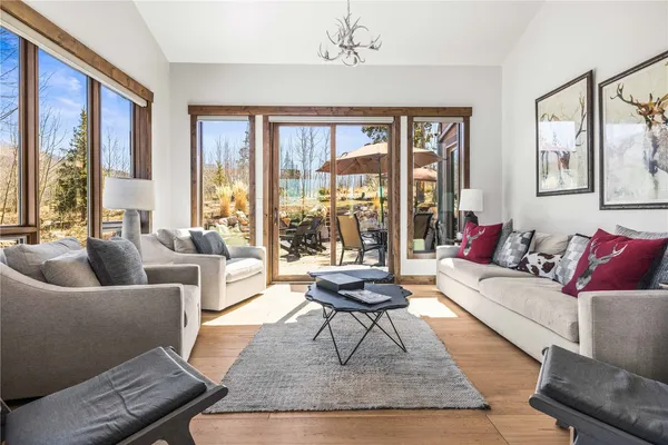 a living room with furniture and a table