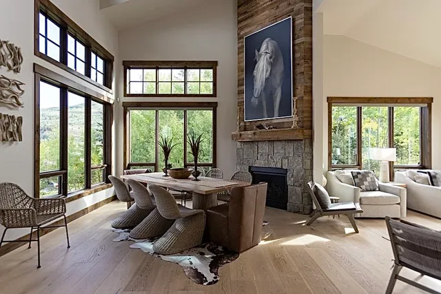 a view of a livingroom with furniture and a fireplace