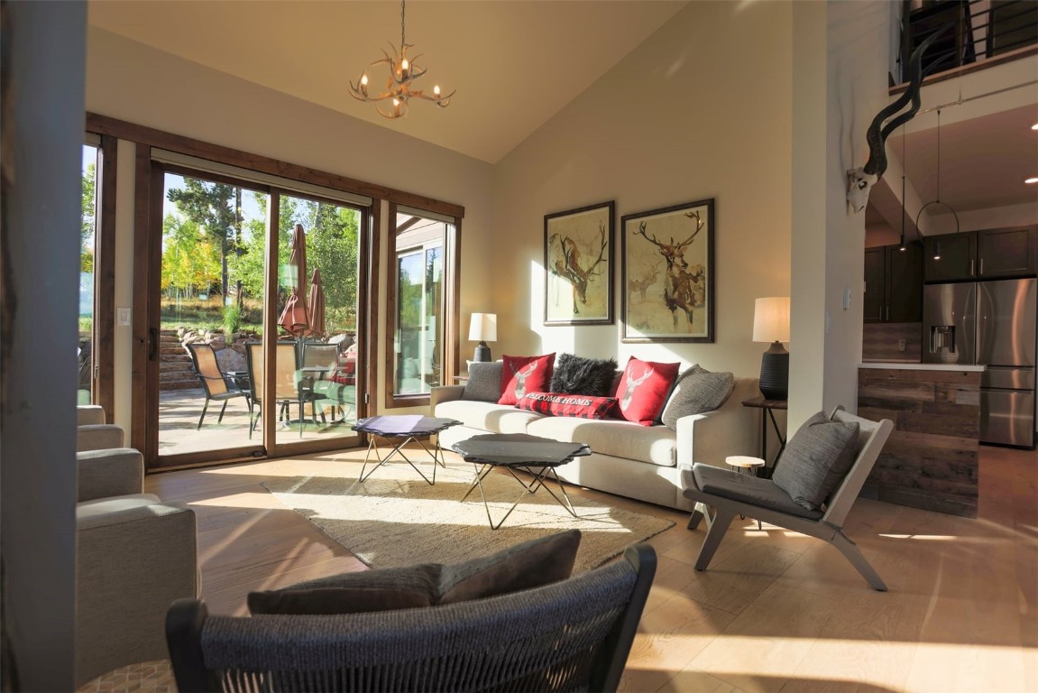 230 Game Trail Road Silverthorne, CO 80498 - Photo 9 of 46 a living room with furniture and a large window