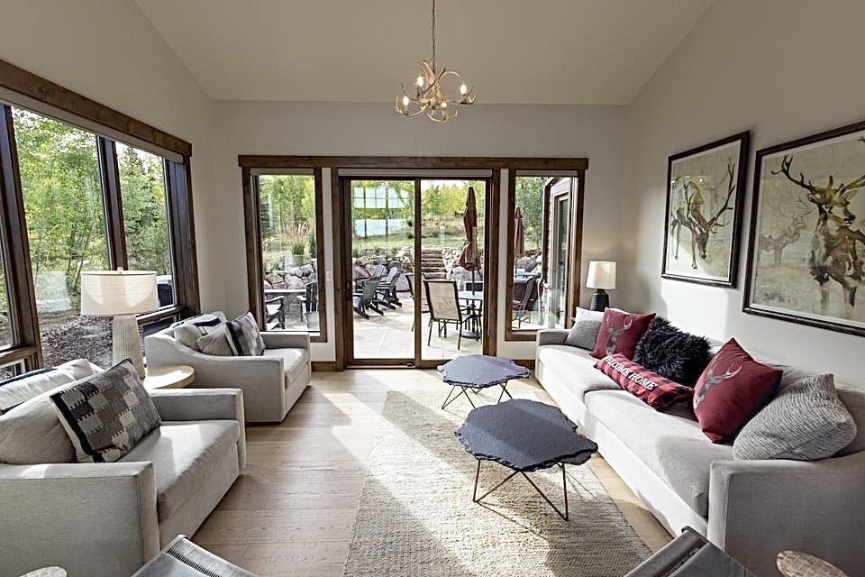 230 Game Trail Road Silverthorne, CO 80498 - Photo 10 of 46 a living room with furniture and a large window