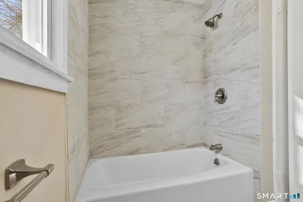 a bathroom with a bathtub
