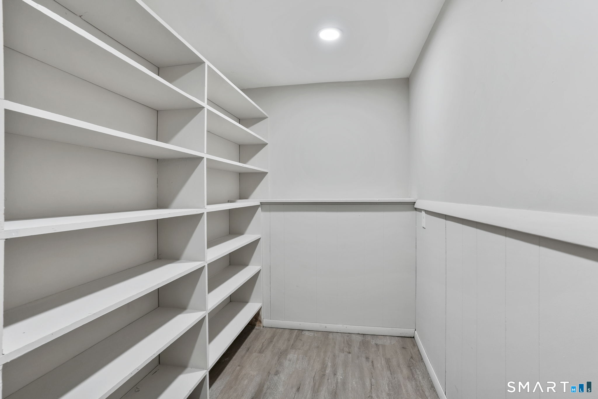 1 Winfield Avenue Wolcott, CT 06716 - Photo 26 of 37 a view of walk in closet with empty racks