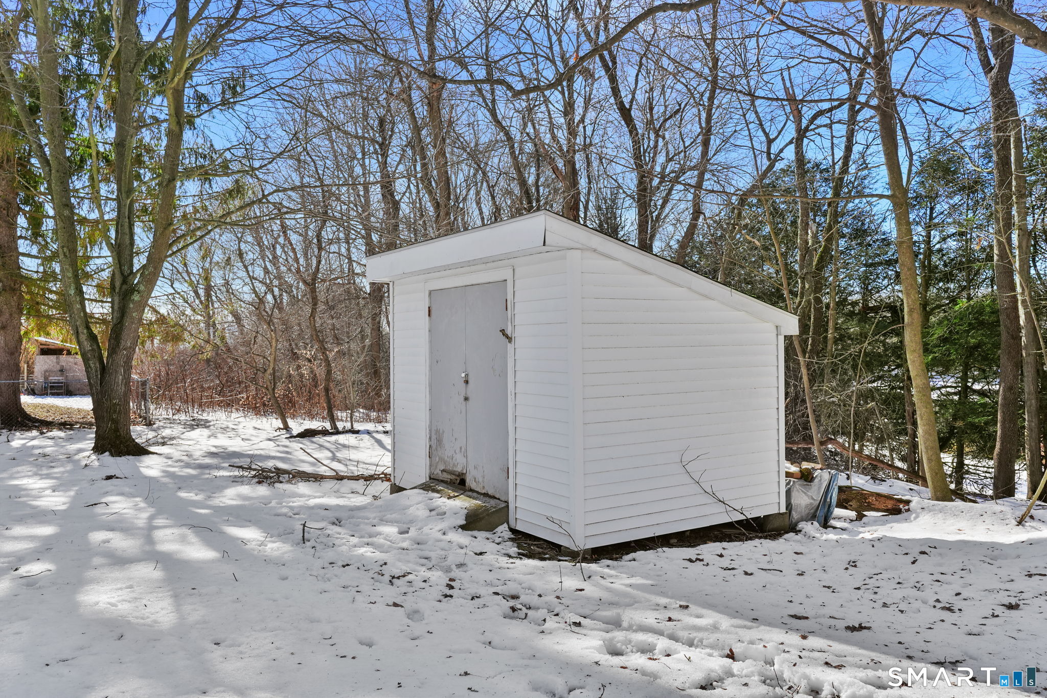 1 Winfield Avenue Wolcott, CT 06716 - Photo 35 of 37 a view of a house with a snow in the yard