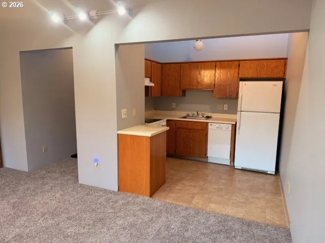 a room with furniture and book shelf